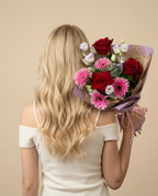 Cherry Blush Bouquet held by model — editorial